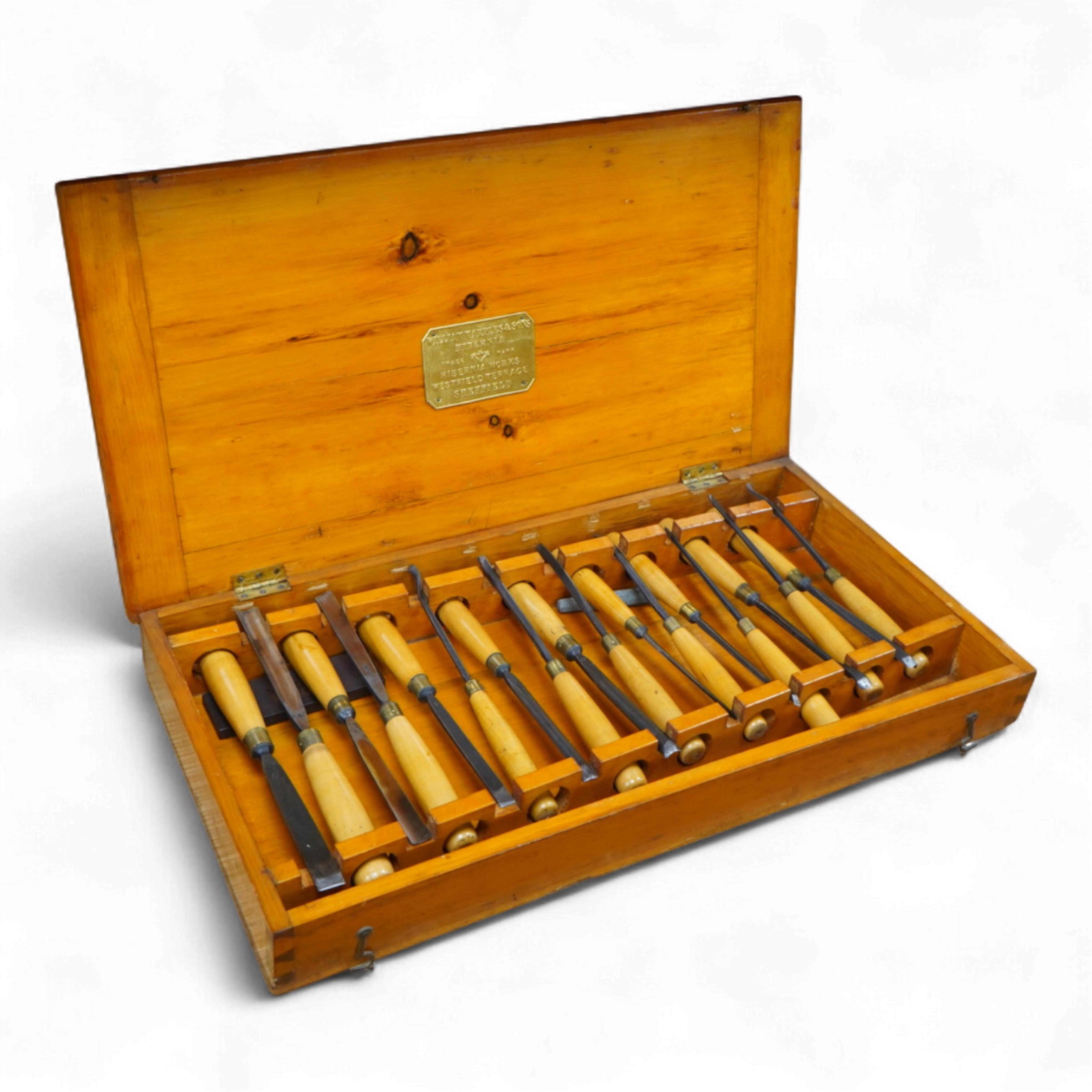 An 18-piece Marples wood carving chisel set, contained within the original fitted pine case with original Marples label to the inside of the lid